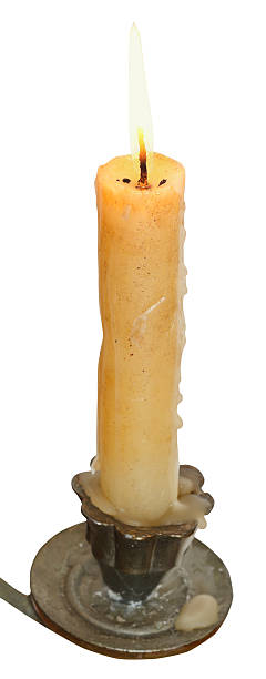 istock lighted candle close up in candleholder 509829467