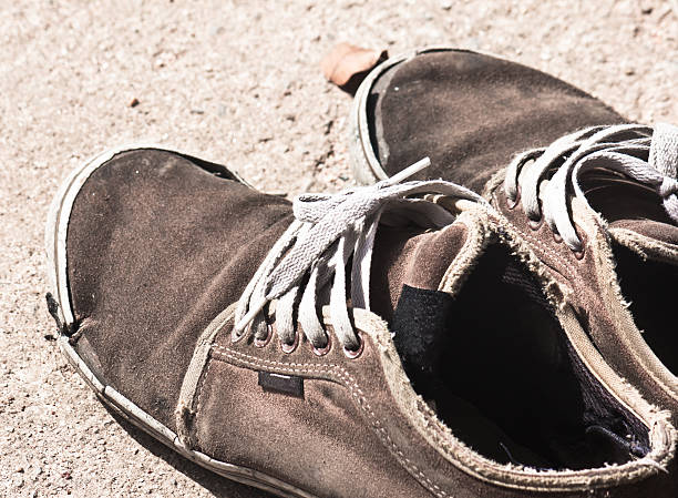 istock old sneaker on grungy background 509842336