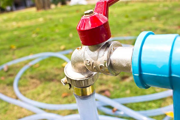 water valve on the garden water valve on the garden air valve stock pictures, royalty-free photos & images