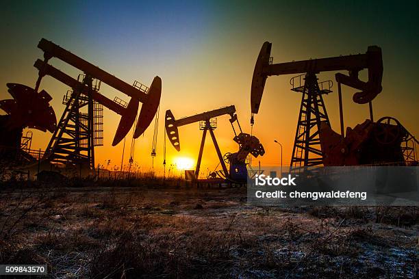 Pumping Unit In Sun Stock Photo - Download Image Now - Crude Oil, Oil Field, Oil Industry