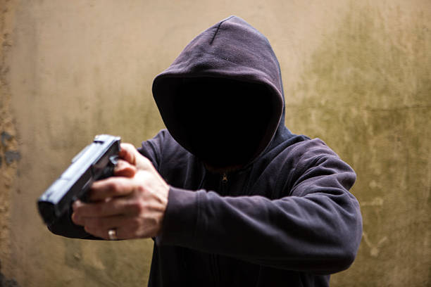 istock Burglar with a gun 509844962