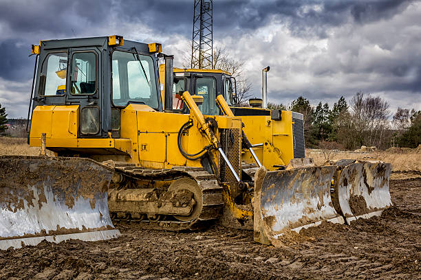 istock Yellows bulldozers in road construction 509845372
