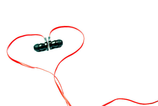istock red earphone in heart shape symbol and spacing for caption 509846436