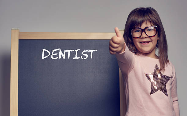 istock thumbs up for dentist 509847660