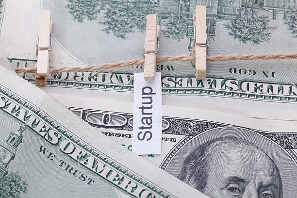 istock The dollar bills with rope, with a sign - Startup 509848734
