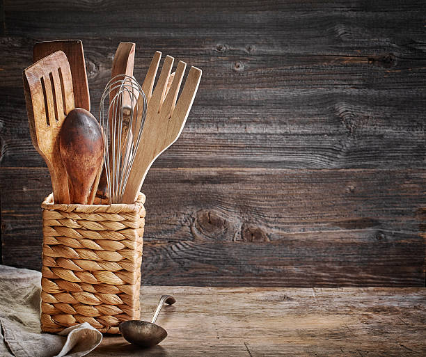 istock cooking utensil on wooden table 509849892