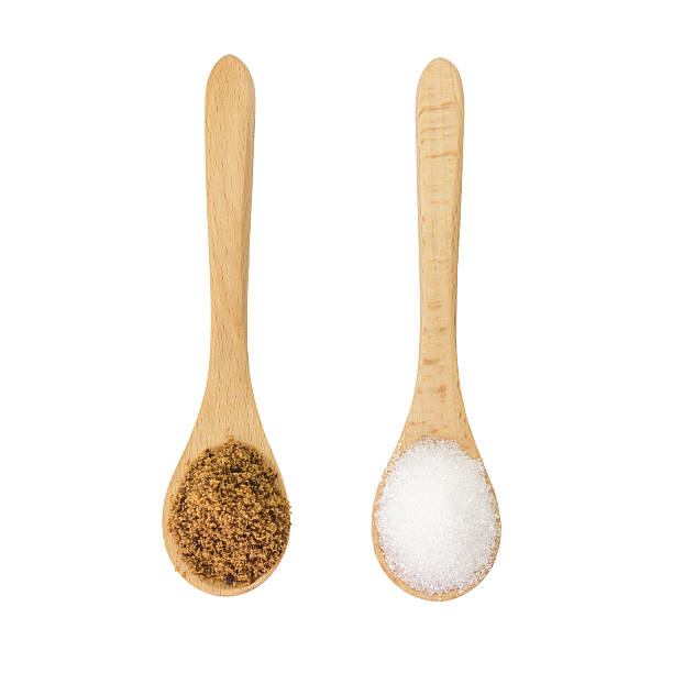 castanho e açúcar branco ingrediente - sugar spoonful imagens e fotografias de stock