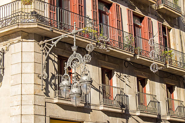 istock Street light and house facade 509857784