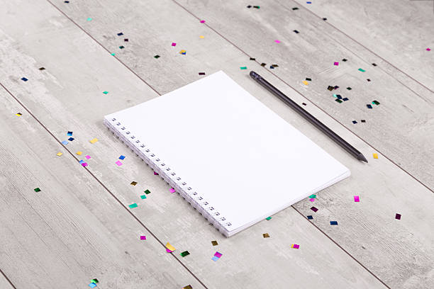 istock Blank notepad and pencil on the wooden table 509858620