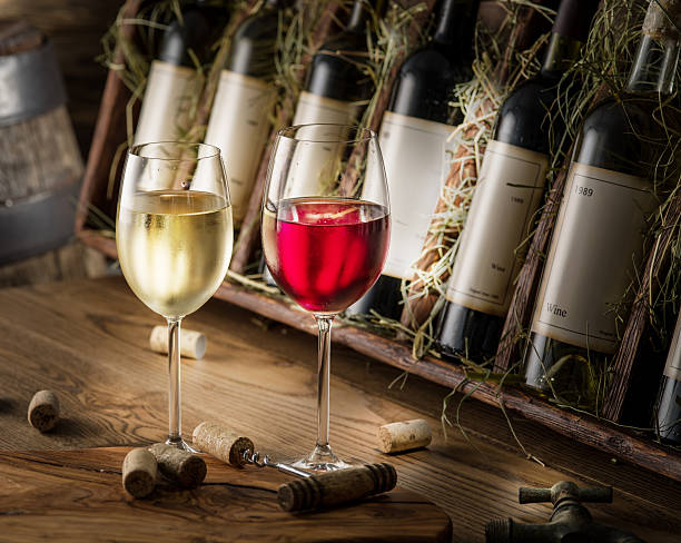 istock Wine bottles on the wooden shelf. 509859002
