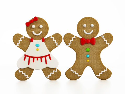 Smiling gingerbread woman, festive glittering background