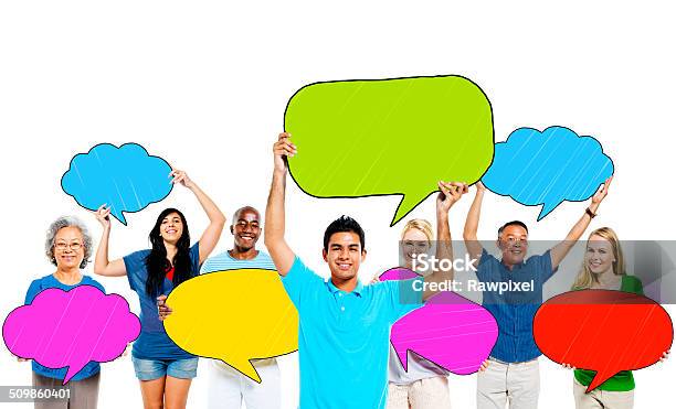 Multiethnic Group Of People And Colourful Speech Bubbles Stock Photo - Download Image Now