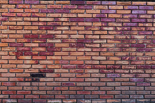 grunge urbain fond d'un mur de briques avec un look vintage - pay phone brick wall telephone old photos et images de collection