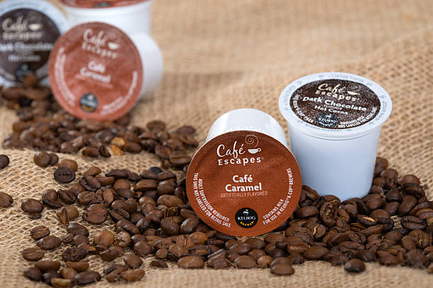 Keurig K-cups and coffee beans stock photo