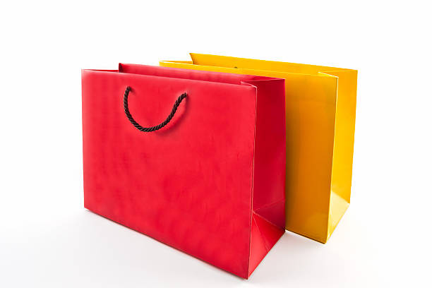 istock Blank red and yellow paper shopping bag . 509862185