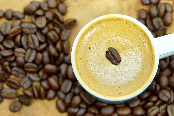 istock Coffee and coffee bean on wood background 509862491