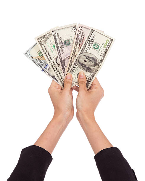 istock Cash in hand isolated on white background 509862901