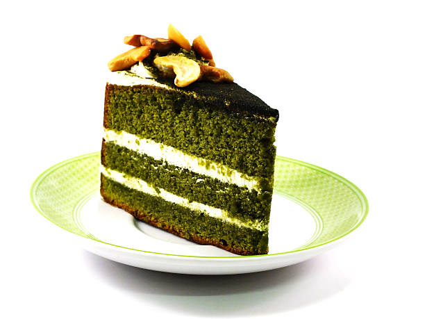 green tea cake with cream and cashew nut