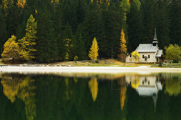 istock Church Reflection on Lago di Braies, Dolomites, Italy 509865995
