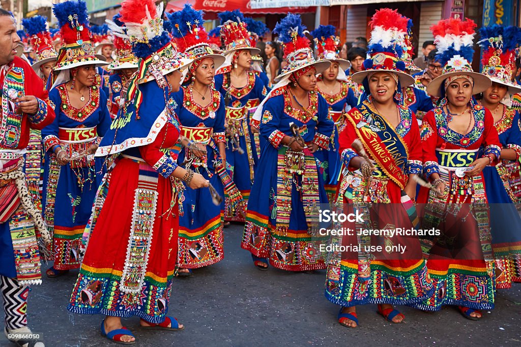 Tinku Dance Group Arica, Сhile - January 24, 2016: Colourfully dressed Tinku dance group performing as part of the annual Carnaval Andino con la Fuerza del Sol in Arica, Chile. The event attracts around 10,000 dancers and musicians. Adult Stock Photo