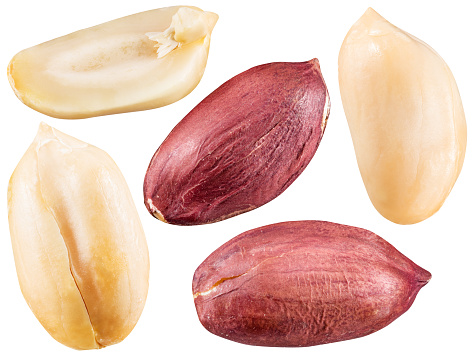 Peeled and opened peanuts. File contains clipping paths for each of nut.