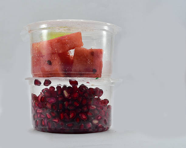 Sliced watermelon and peeled Pomegranate
