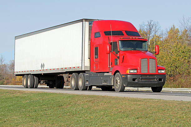 istock Semi Truck Hauling Freight On The Highway 509867990