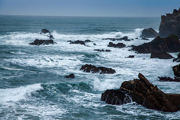 istock wild Atlantic storm waves breaking on rocky coast 509869864