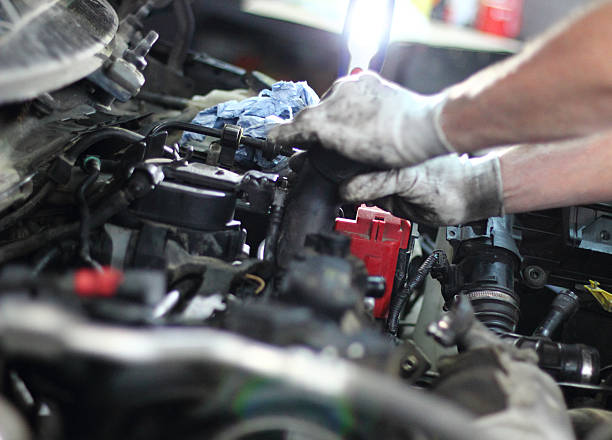 istock Car mechanic repair an engine 509870836