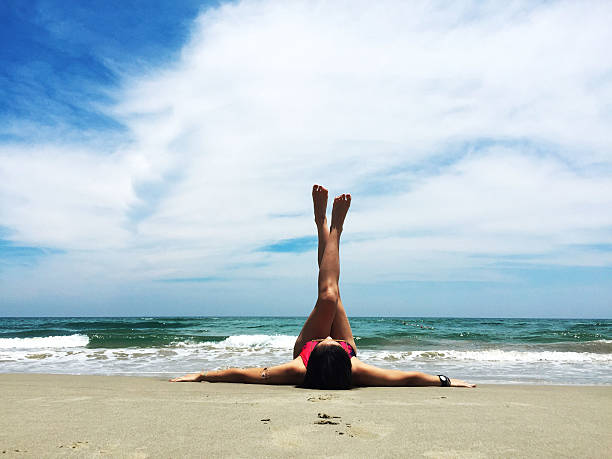 istock female model striking a pose on a beach 509871322