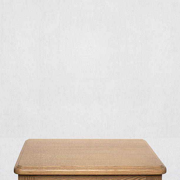istock wooden table near the wall 509872858