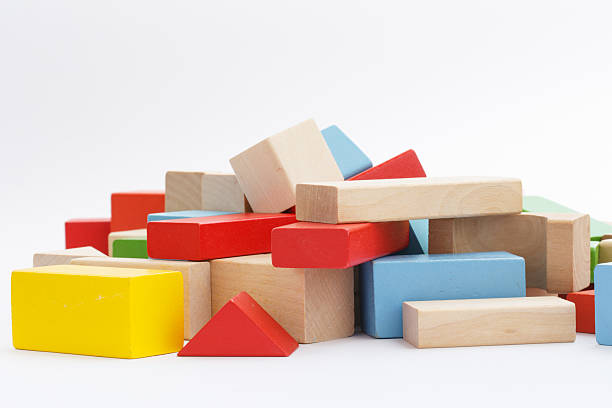 istock Wooden building blocks isolated on white background 509891499