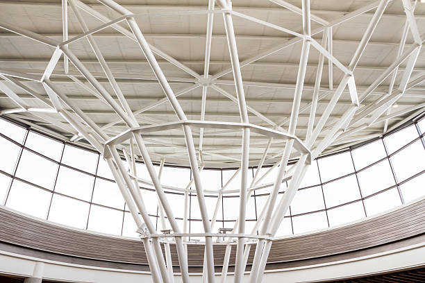 istock steel structure of modern building roof 509891959
