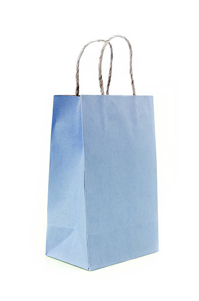 istock Blue paper bag on white background 509892665