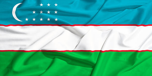 istock Uzbekistan flag on a silk drape waving 509892695