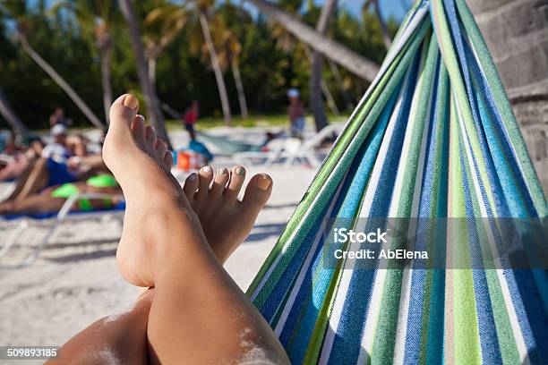 Beautiful Female Legs On The Beach Stock Photo - Download Image Now - Adult, Barefoot, Beach