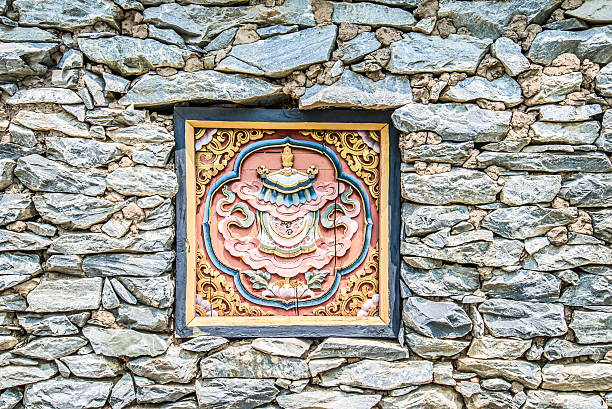 istock Wooded window and rock wall from bhutan 509894569