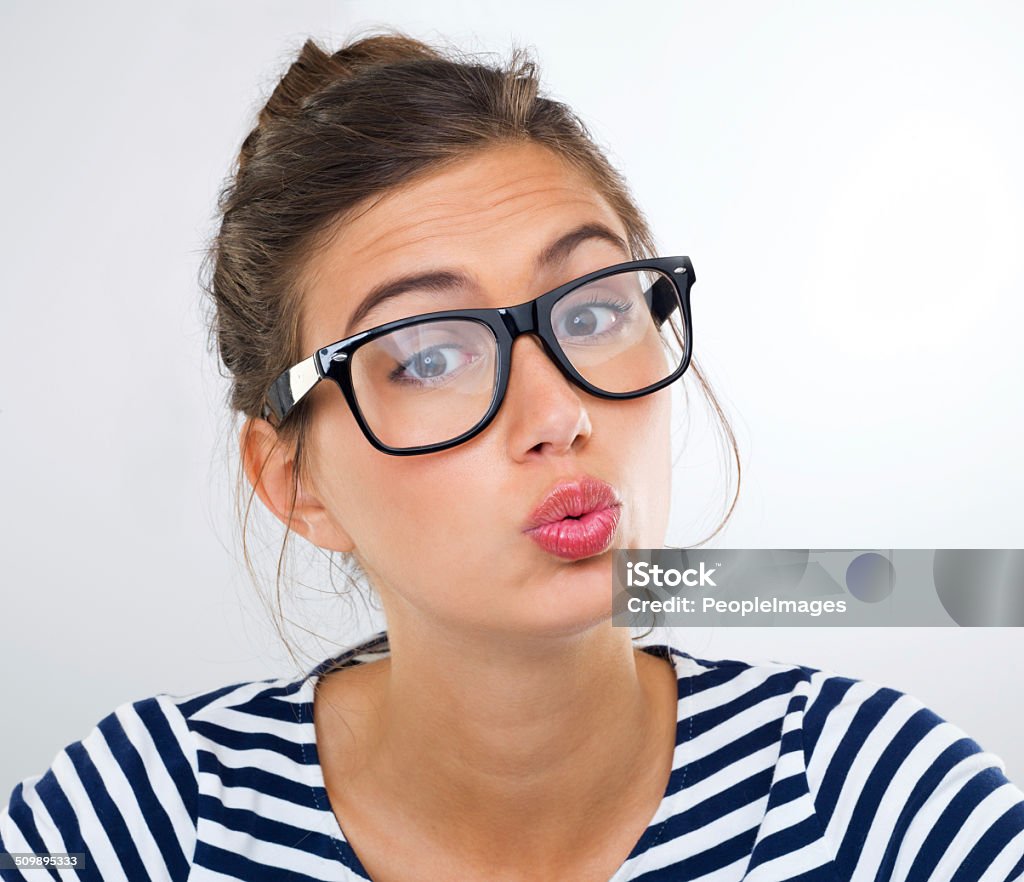 Ooh! You're in trouble now! Studio shot of a gorgeous young woman wearing glasses 20-24 Years Stock Photo