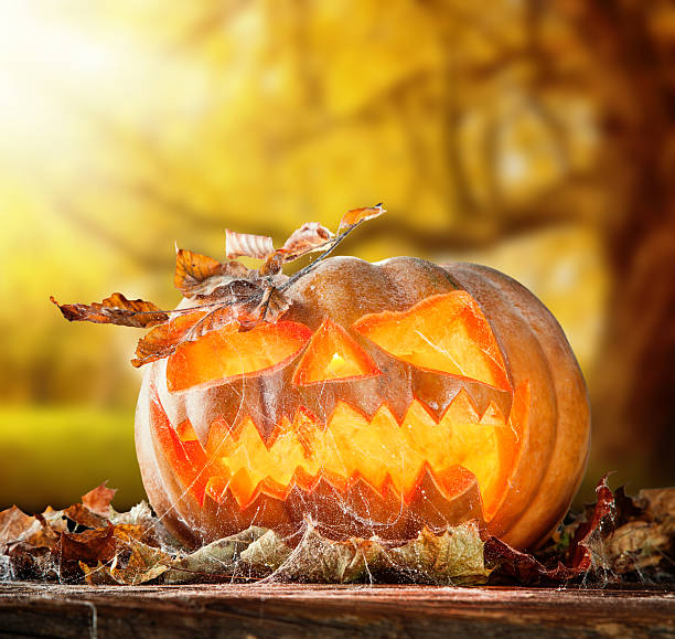 istock Scary hallowen pumpkin on wood 509895793