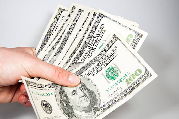 istock American Dollars as a currency on a white background 509896639