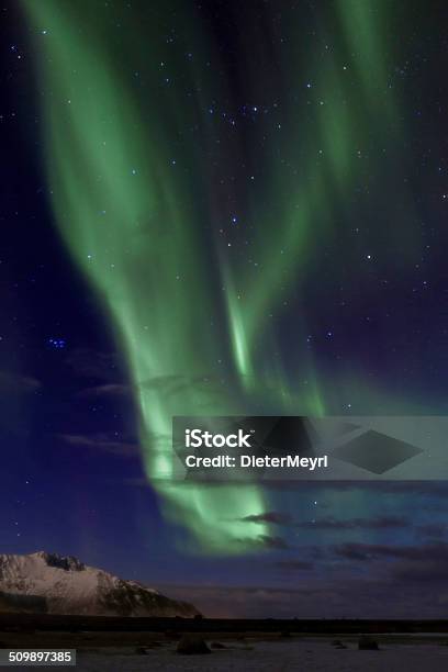 Aurora Borealis Burning Mouintains Stock Photo - Download Image Now - North Pole, Arctic, Atmospheric Mood