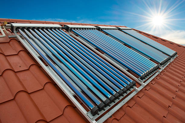 Vacuum collectors- solar water heating system stock photo