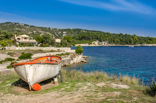 Old lifeboat ashore overlooking the Ionian sea in Greece