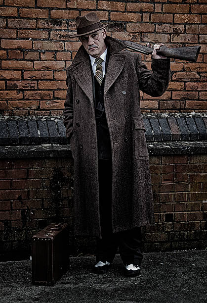 istock 1940s Male holding a rifle 509910156