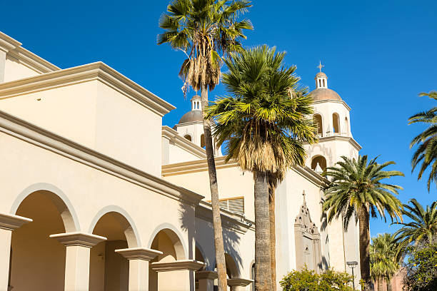 istock Mission San Xavier del Bac - Courtyard, Palms, Blue Sky 509910202