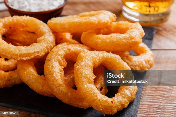 Fried Onion Rings In Batter With Sauce Stock Photo - Download Image Now - Appetizer, Batter - Food, Crunchy