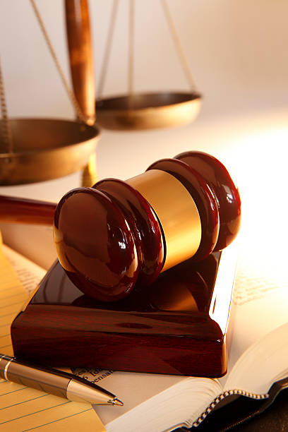 istock Gavel Resting On Top Of Open Law Book 509911648