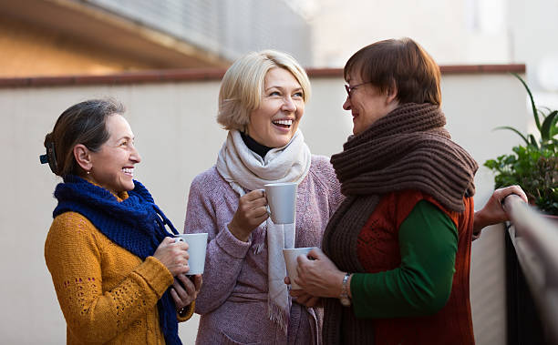 istock Senior women drinking tea at balcony 509915672