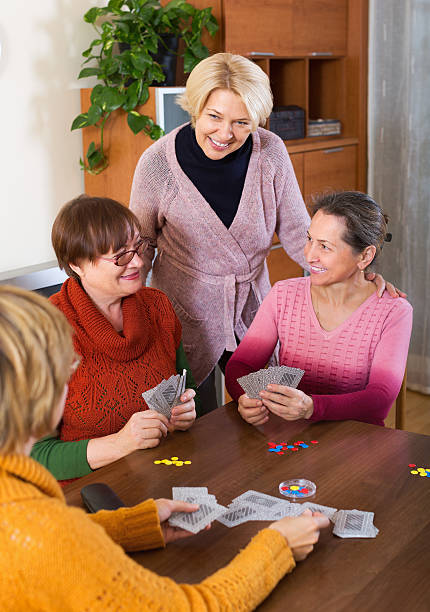 istock Women having fun with cards 509916186