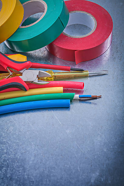 istock Insulating tapes electric cables insulated turnscrew nippers con 509916384